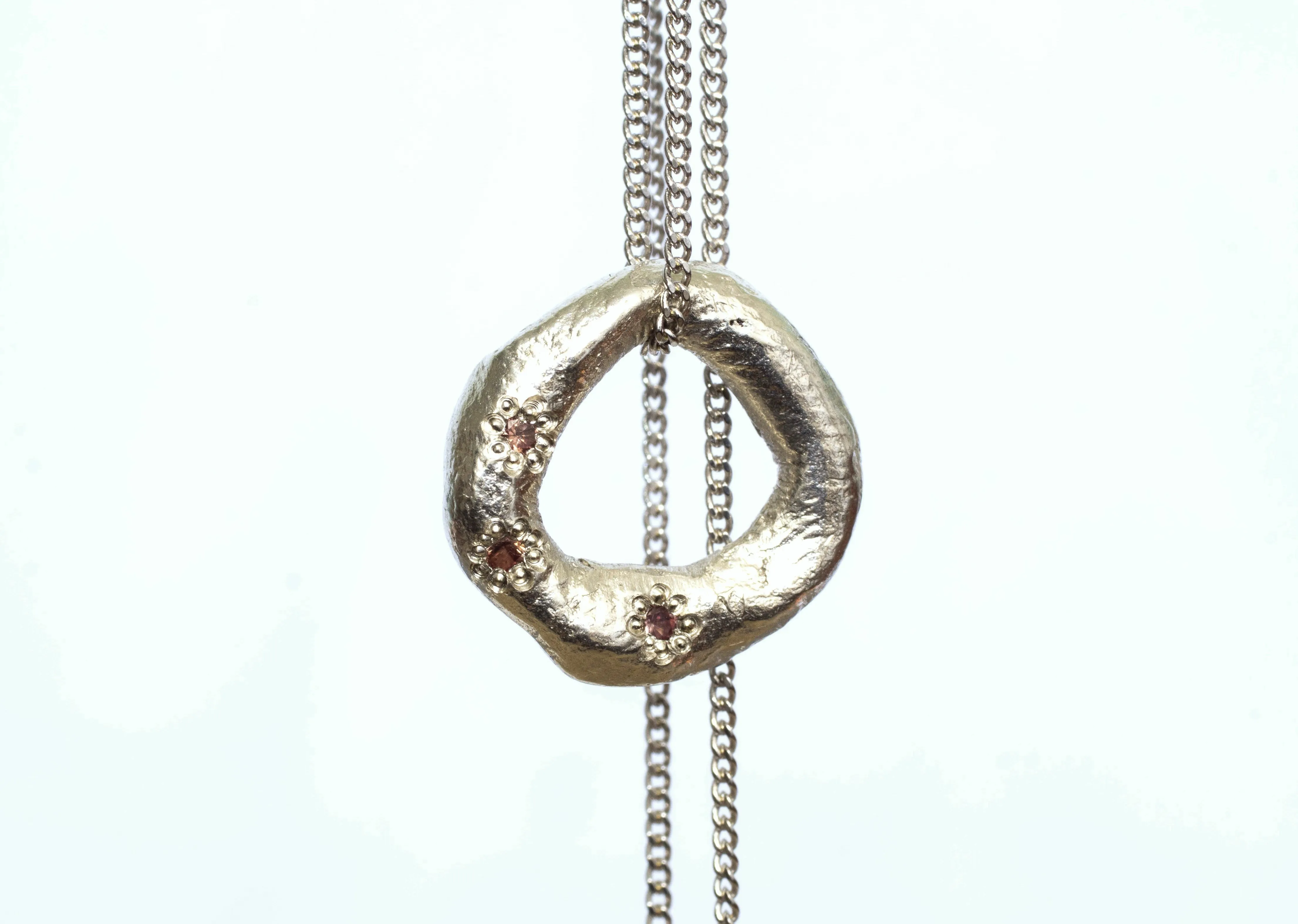 Circle Pendant - White Gold with Padparadscha Sapphires sold by Sophie Divett Jewelry product image thumbnail 3