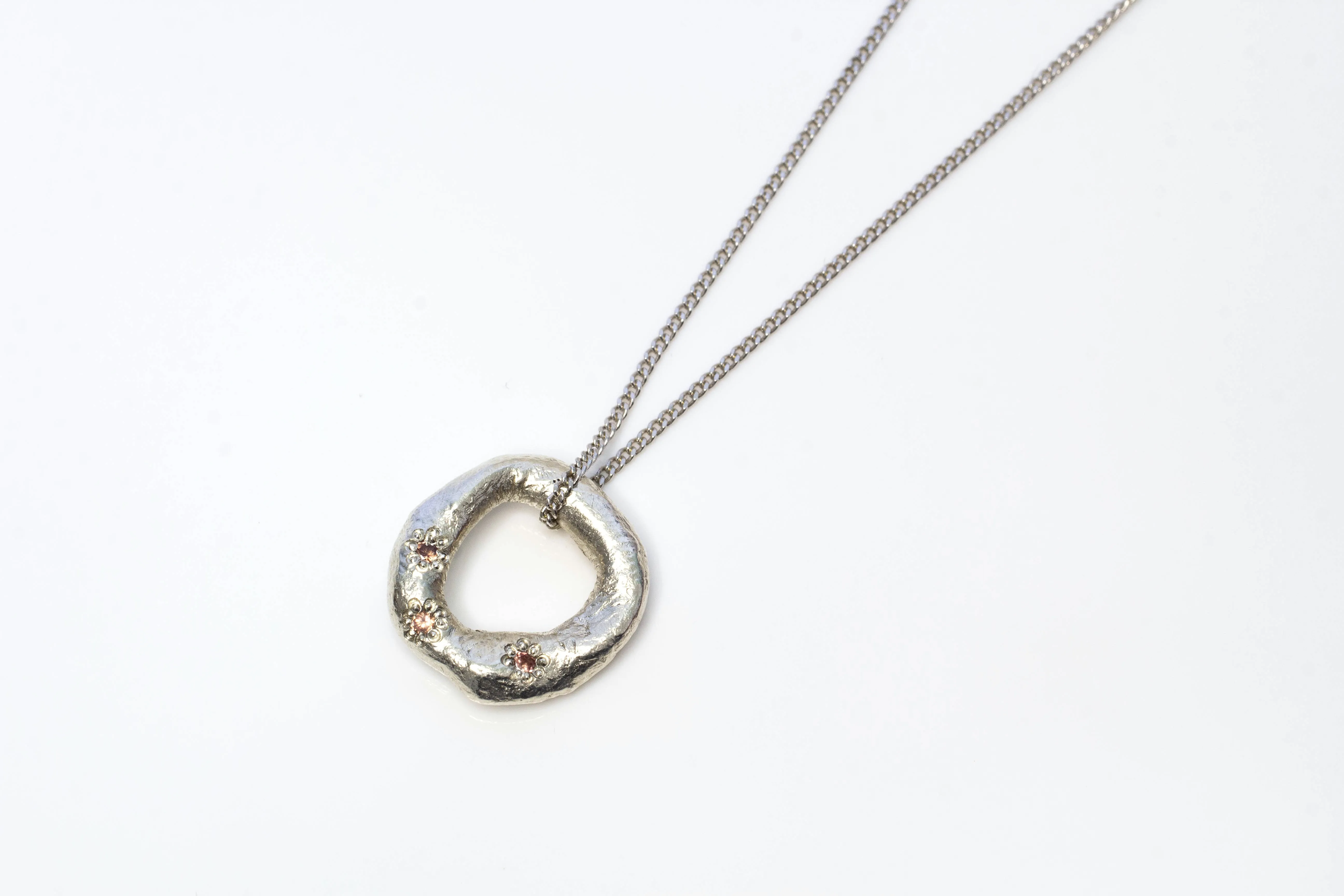 Circle Pendant - White Gold with Padparadscha Sapphires sold by Sophie Divett Jewelry product image thumbnail 2