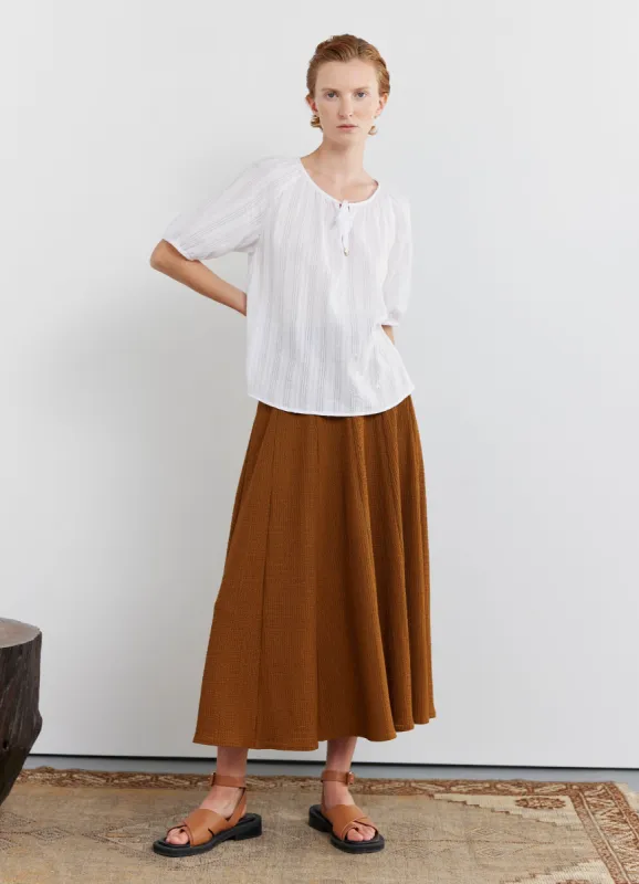 Cross-stitched top sold by Kate Sylvester