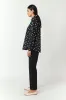 Twill cigarette pant sold by Kate Sylvester