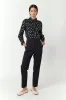 Twill cigarette pant sold by Kate Sylvester