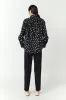 Twill cigarette pant sold by Kate Sylvester