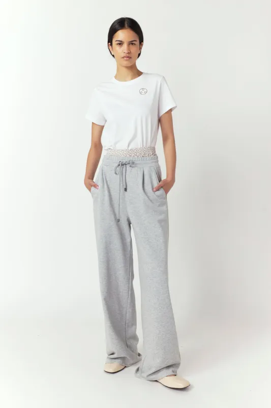 Huddle badge t-shirt sold by Kate Sylvester