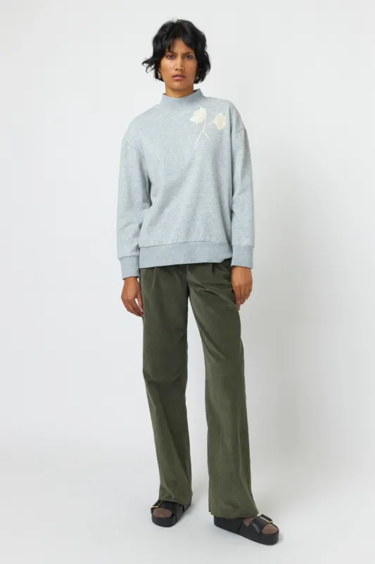 Winter rose sweatshirt sold by Kate Sylvester