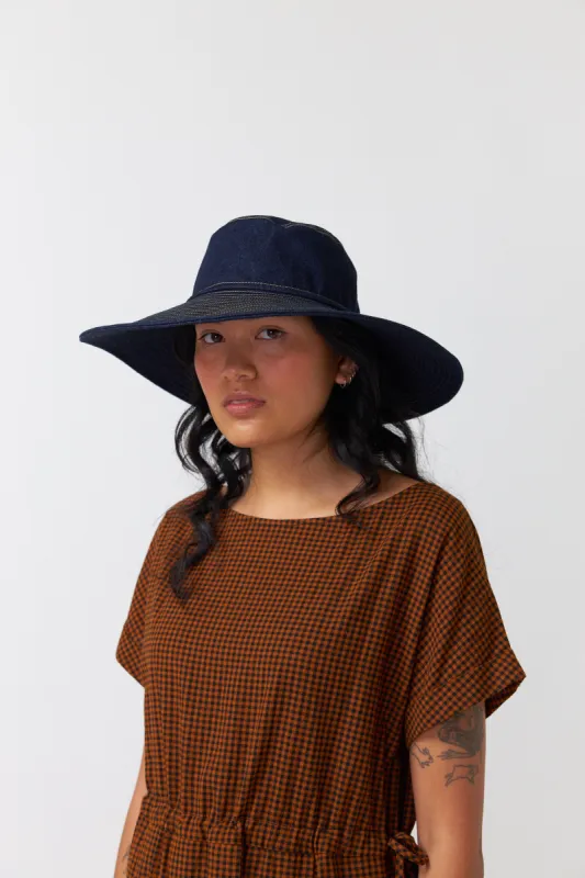 Denim wide brimmed hat sold by Kate Sylvester