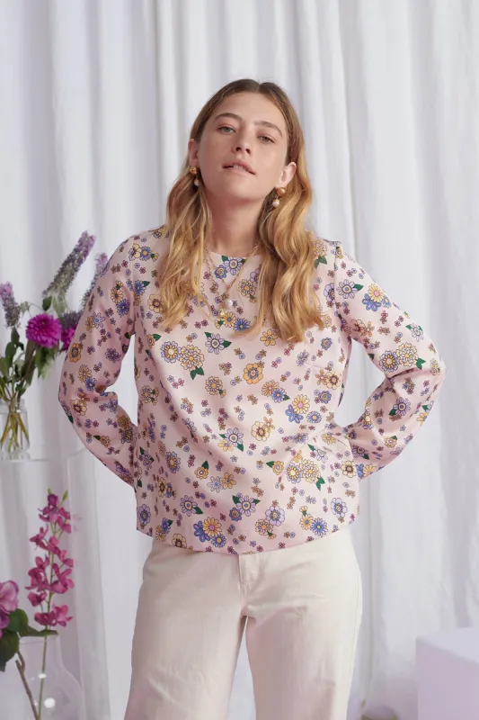 Sweet peach blouse sold by Twenty-Seven Names