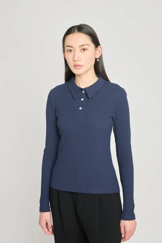 Unpack that polo sold by Twenty-Seven Names