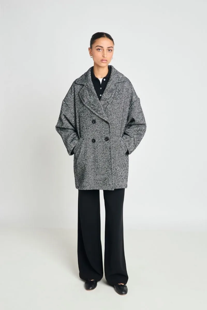 Purpose coat sold by Twenty-Seven Names