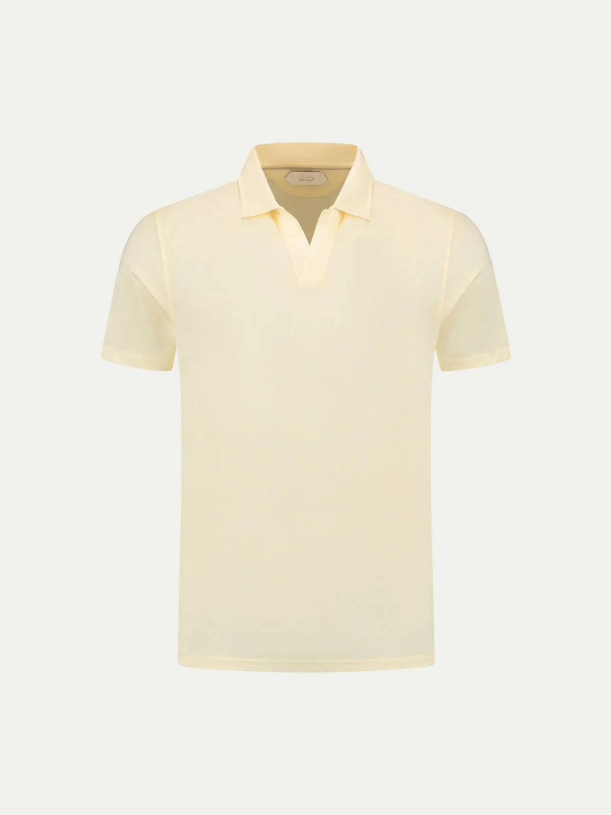 Vanilla Buttonless Polo Shirt sold by Aurelien