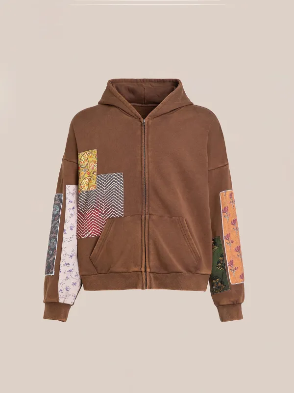 Tapestry Patchwork Zip Up Hoodie sold by Found