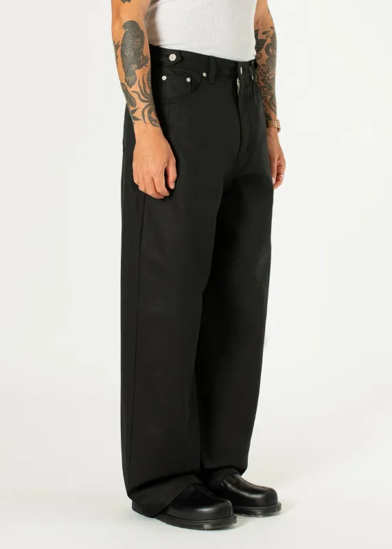 Side-button Denim Jeans made by Estudio Niksen