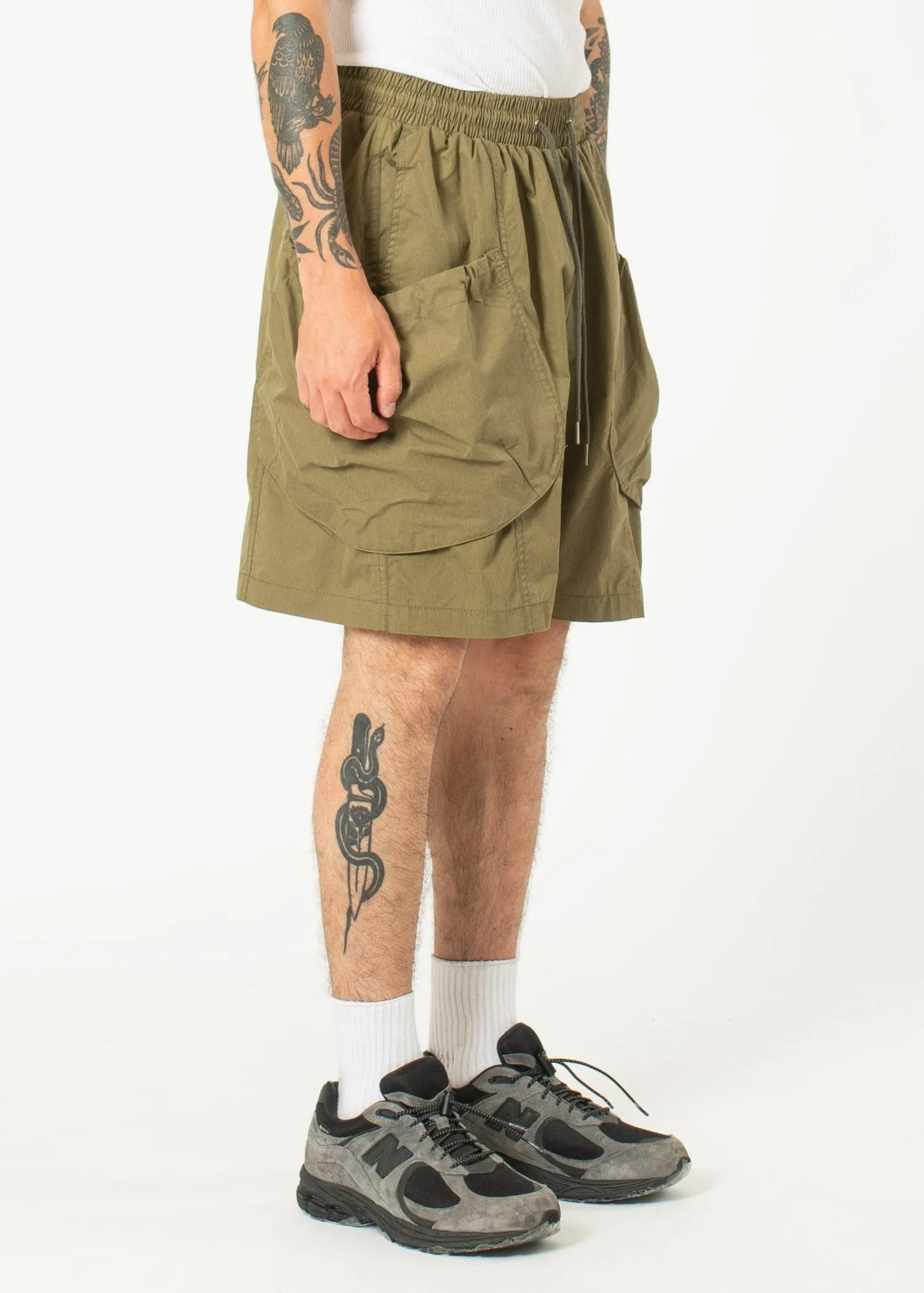 Bungee Cargo Shorts sold by Estudio Niksen