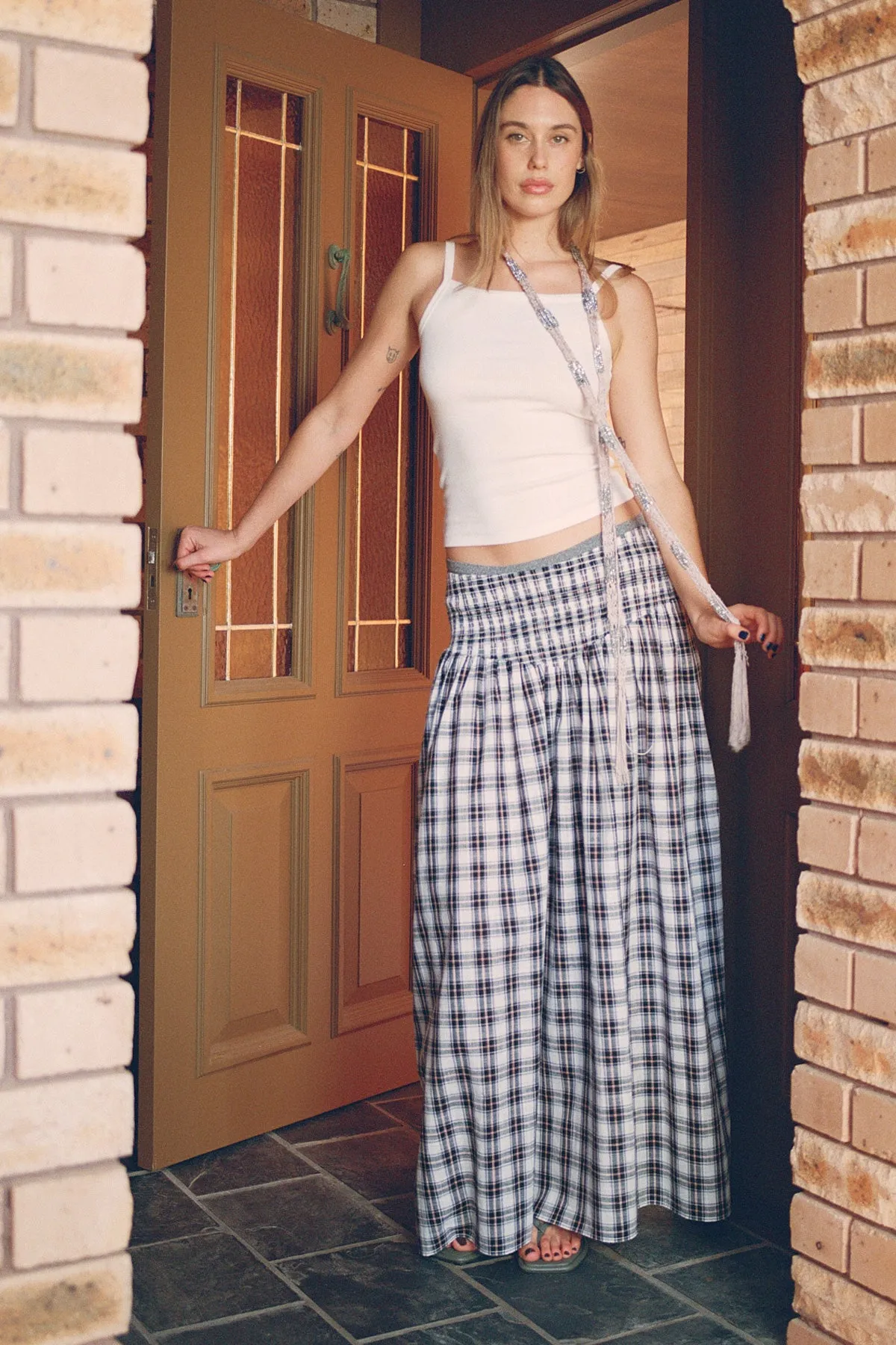 Liquorice Plaid Ruched Skirt sold by Apres Studio