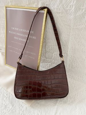 croc embossed baguette bag sold by SHEIN