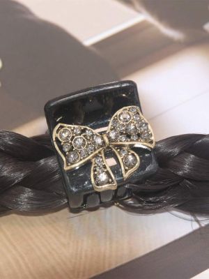 Rhinestone Bow Decor Hair Claw sold by SHEIN