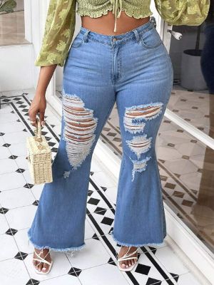 SHEIN Plus Ripped Raw Hem Flare Leg Jeans sold by SHEIN