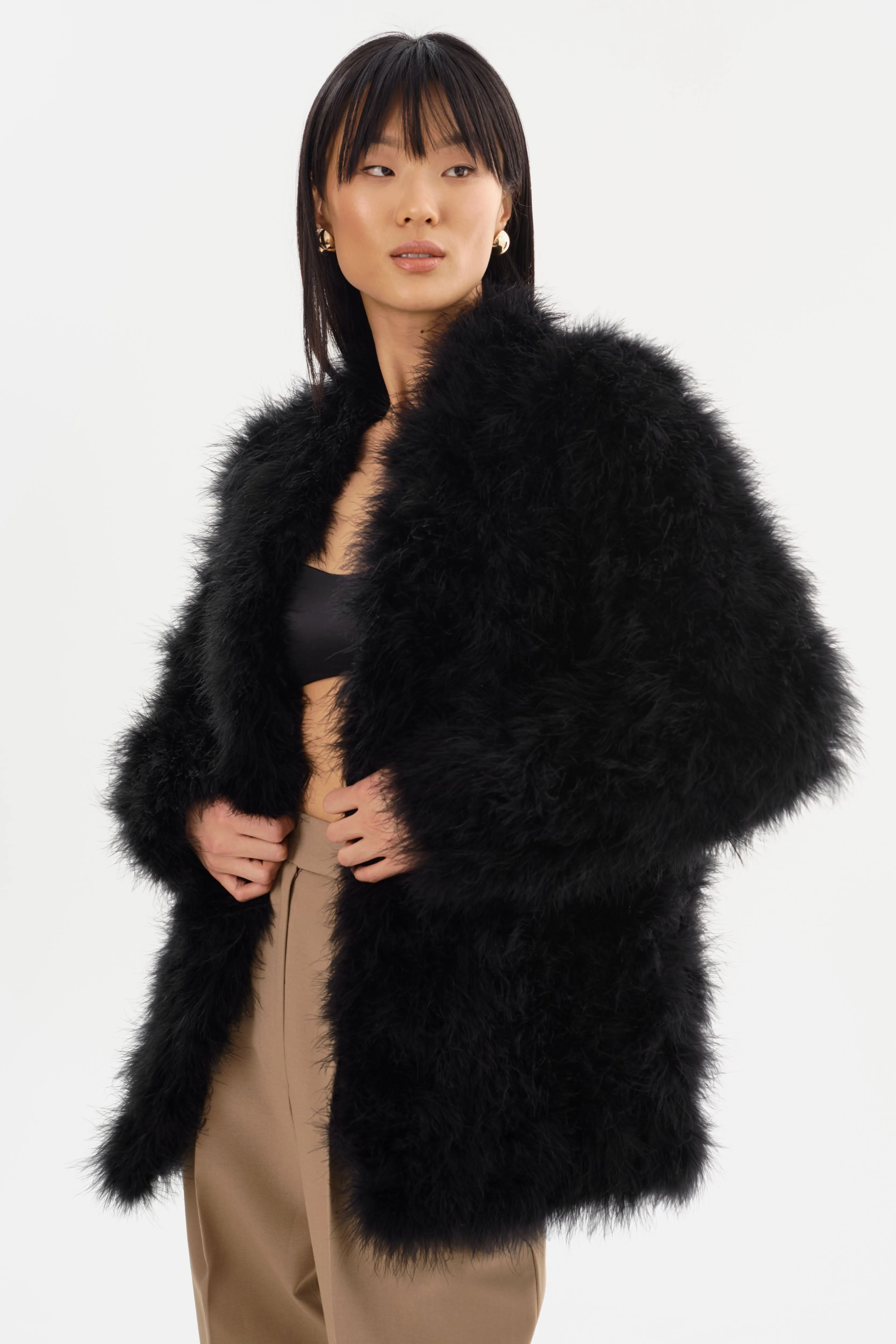 RABEA | Feather Coat sold by La Marque
