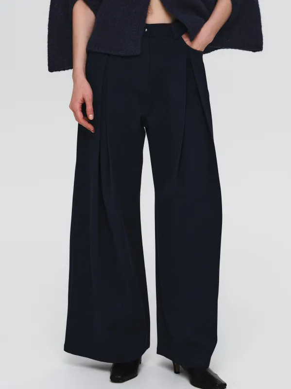 Pleated Trousers, Navy sold by Source Unknown