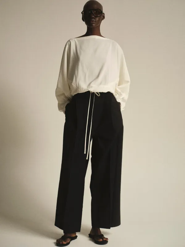 Relaxed Pleated Chinos, Black sold by Source Unknown