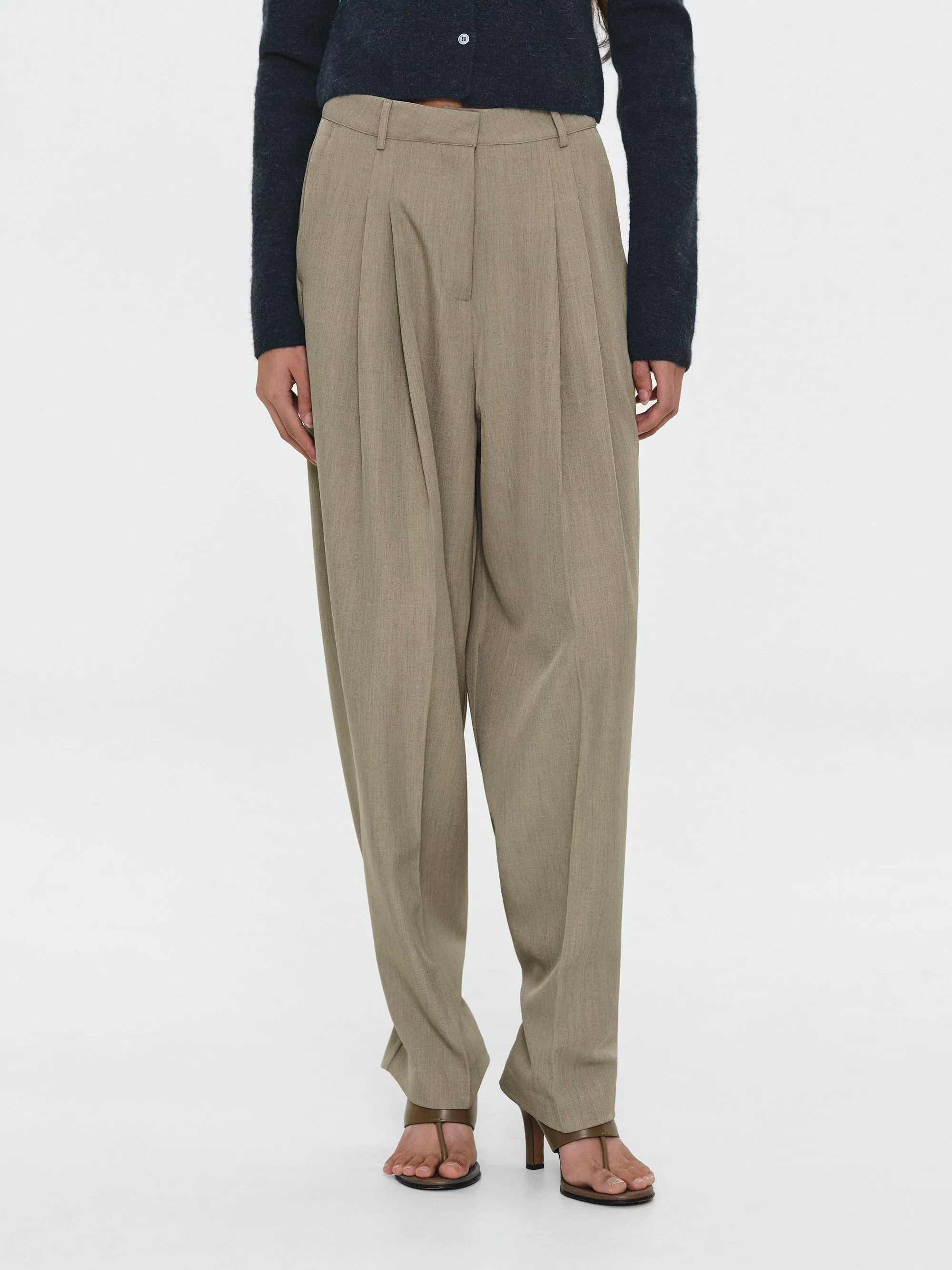 Button Cuff Trousers, Beige sold by Source Unknown