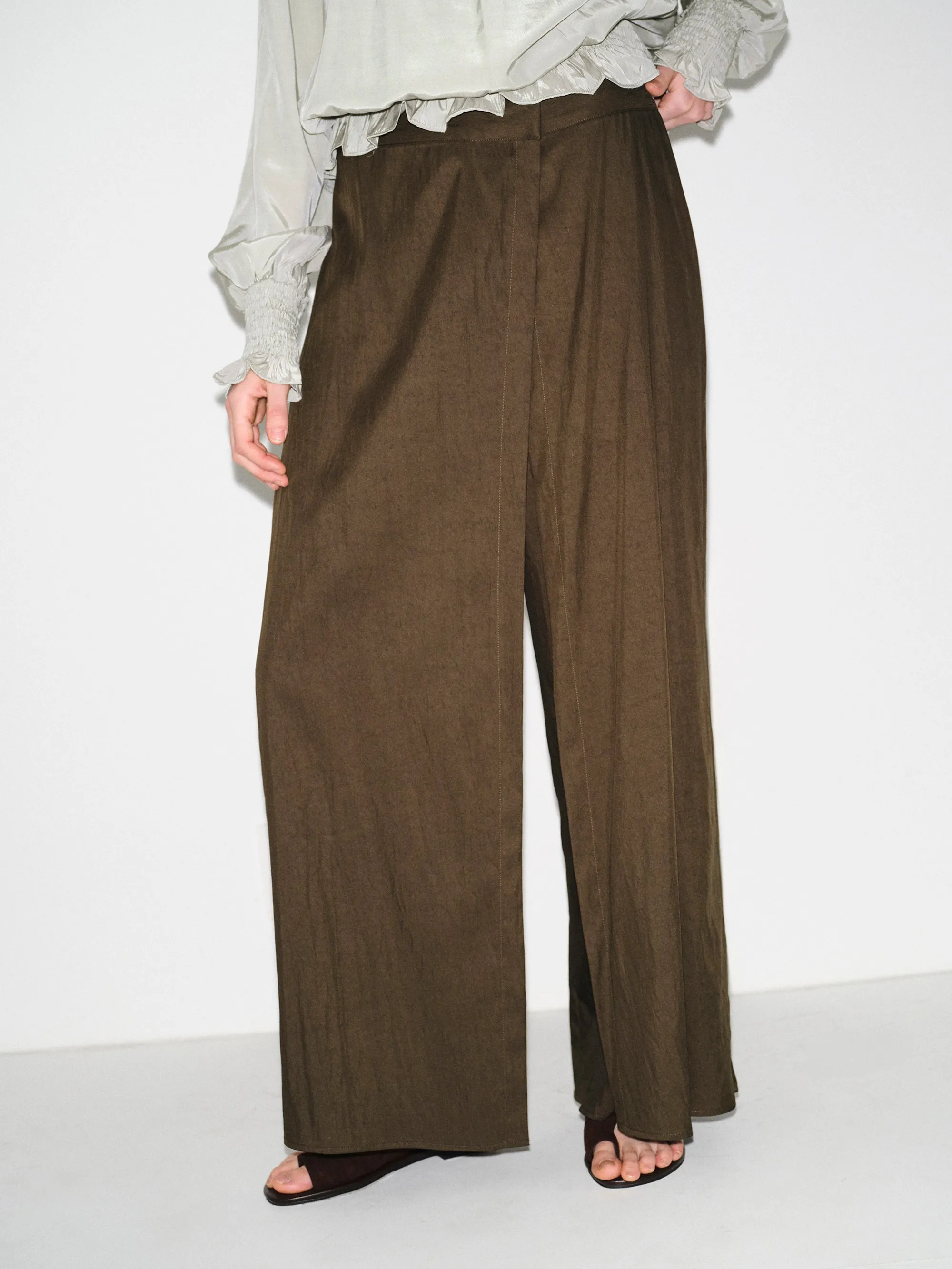 Double-Layer Crinkled Trousers, Brown sold by Source Unknown