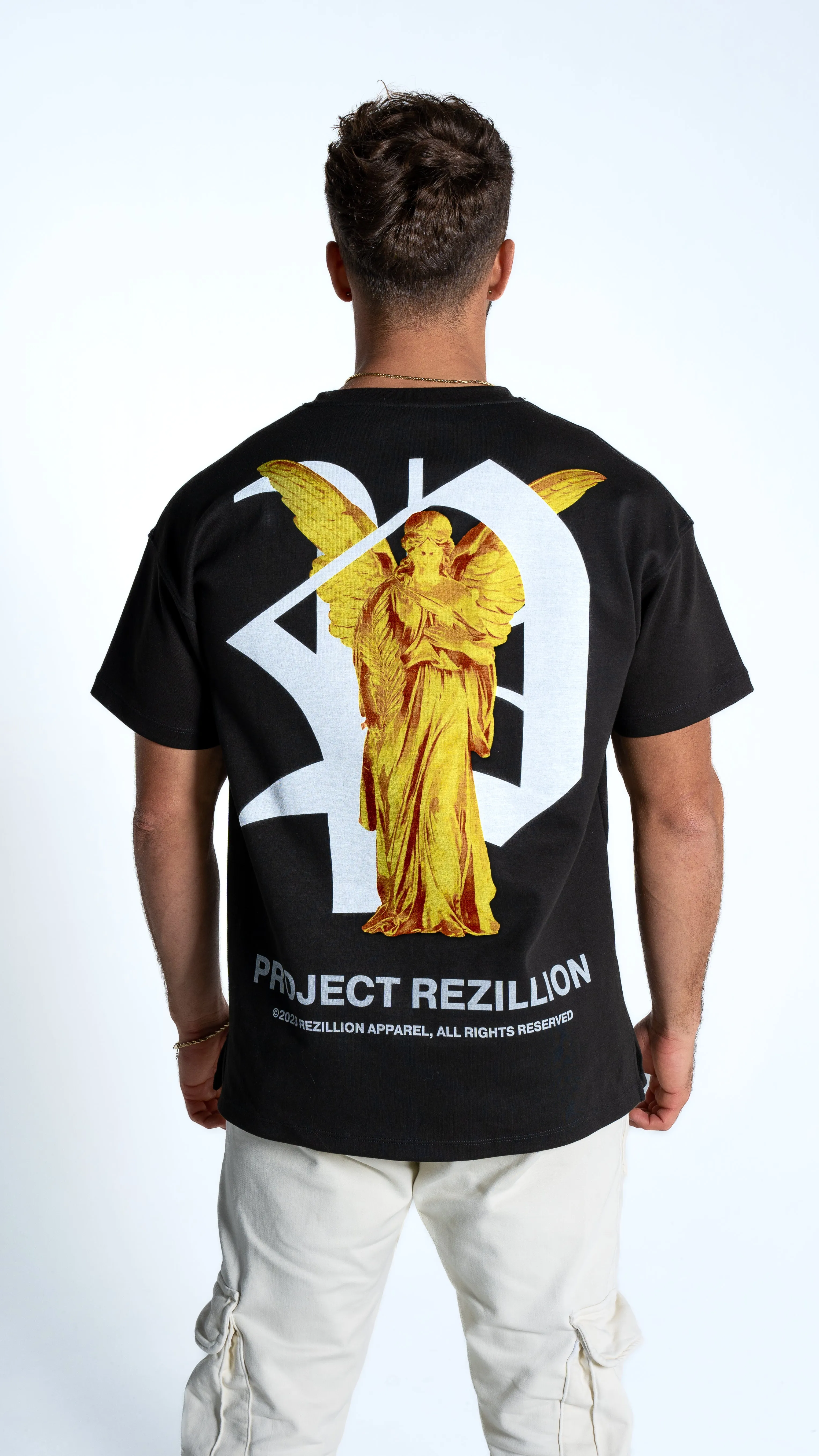 Project Rezillion Angel Tee (Black & Gold) sold by Rezillion Apparel