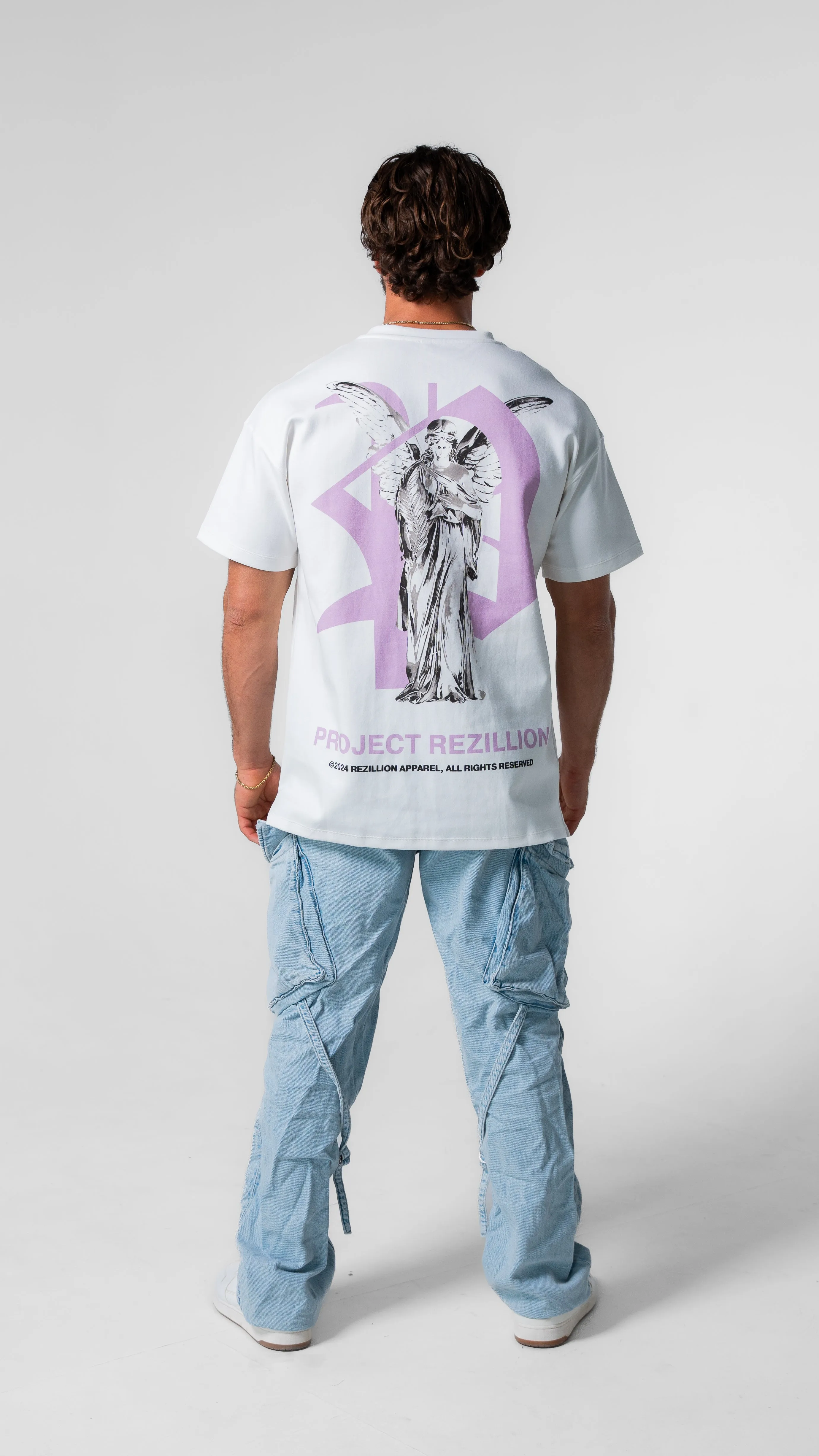 Project Rezillion Angel Tee (White & Purple) sold by Rezillion Apparel