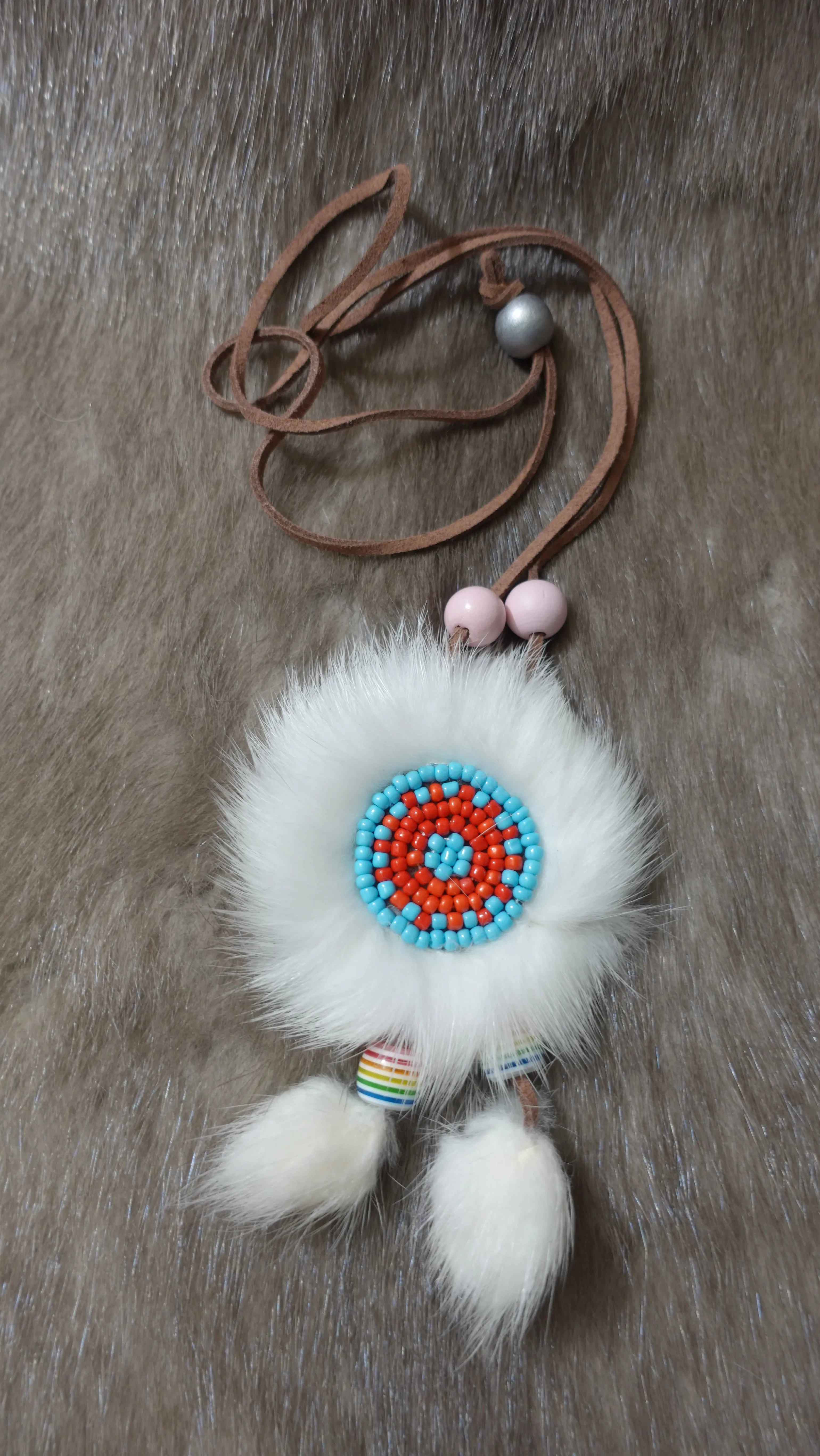 The Oneside Ewenki Sunflower Charm Necklace sold by MOGSki