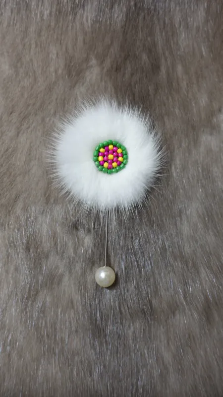 The Ewenki Sunflower Brooch made by MOGSki