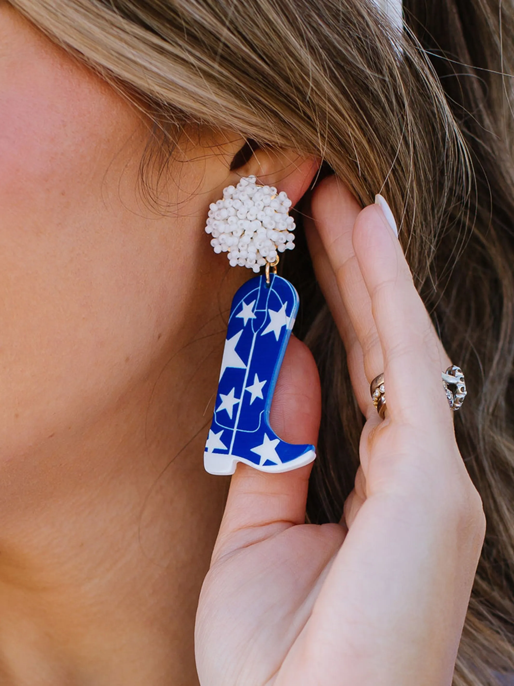 Gameday Cowgirl Earrings | Blue + White sold by Michelle McDowell
