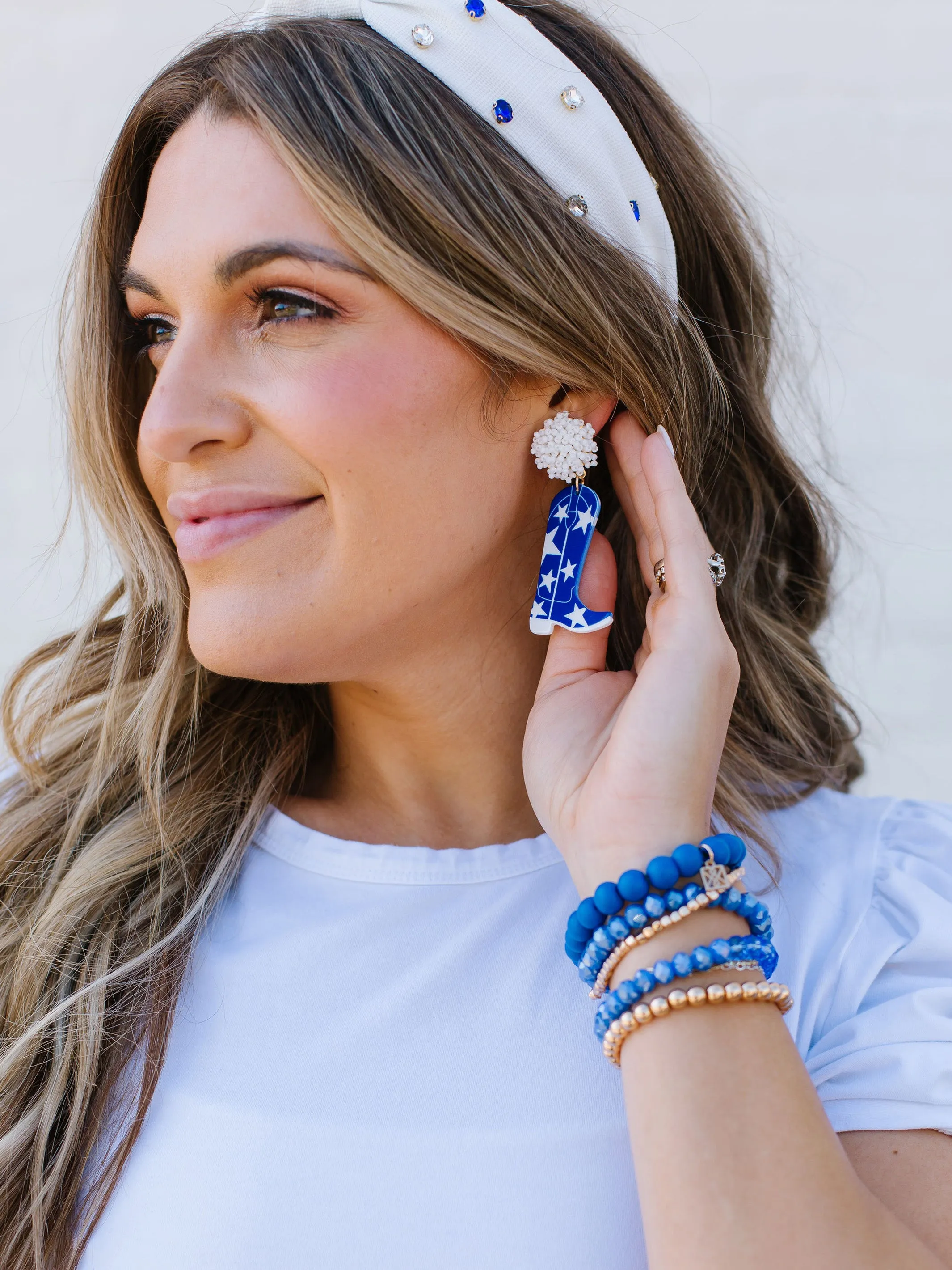 Gameday Cowgirl Earrings | Blue + White sold by Michelle McDowell product image thumbnail 3
