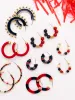 Astrid Earrings | Red sold by Michelle McDowell
