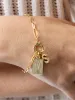 Thea Charm Bracelet sold by Michelle McDowell