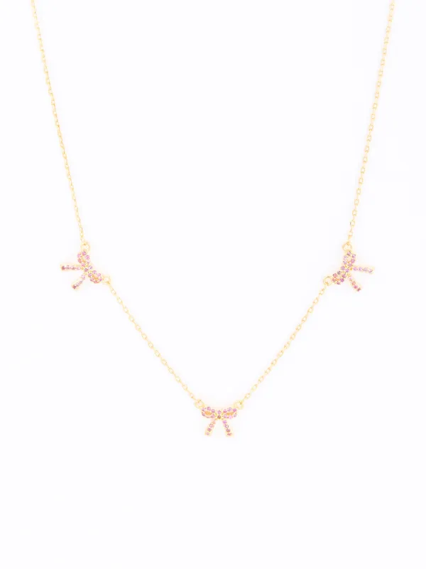 Trio Bow Necklace | Pink sold by Michelle McDowell