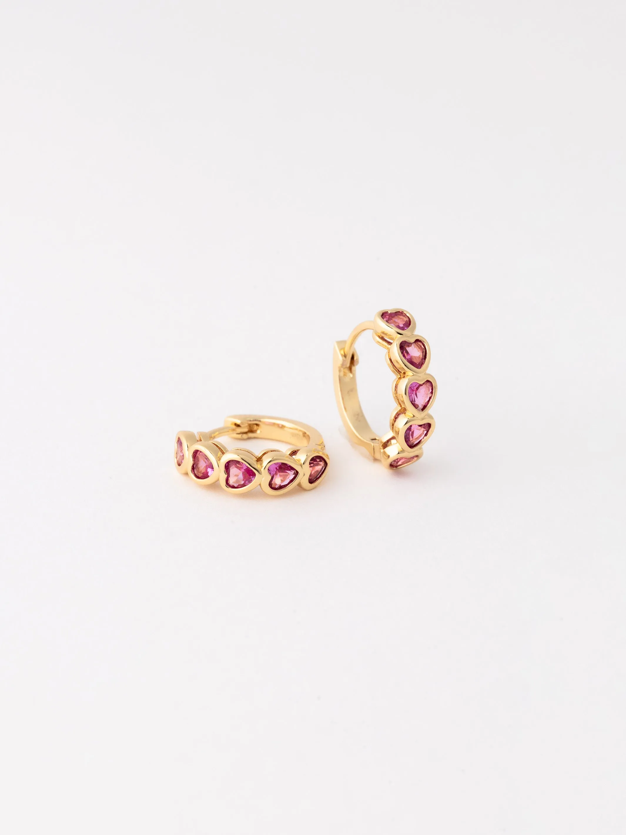 Lucia Heart Huggie Earrings | Pink sold by Michelle McDowell