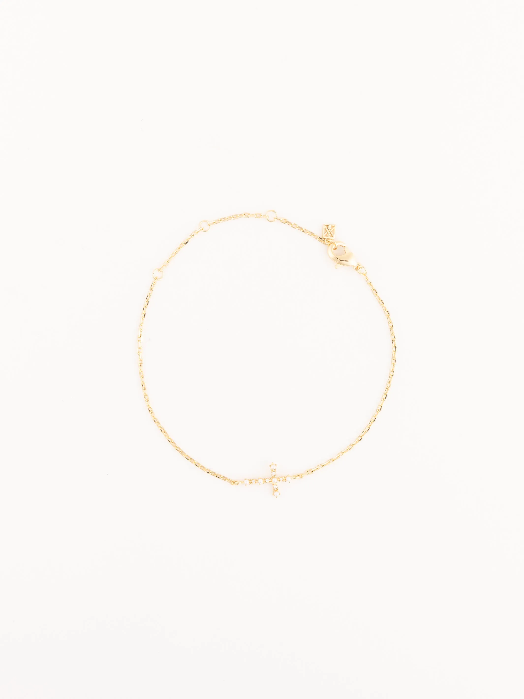 Juniper Cross Bracelet sold by Michelle McDowell