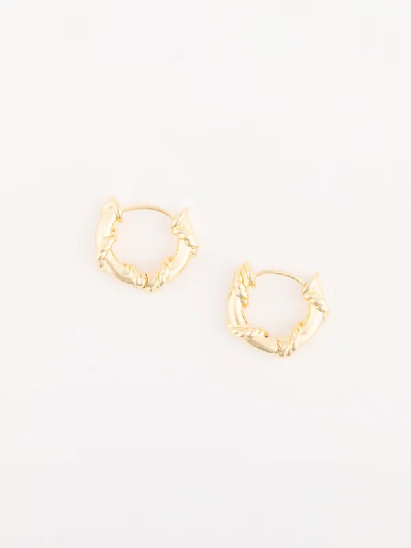 Julia Huggie Earrings sold by Michelle McDowell