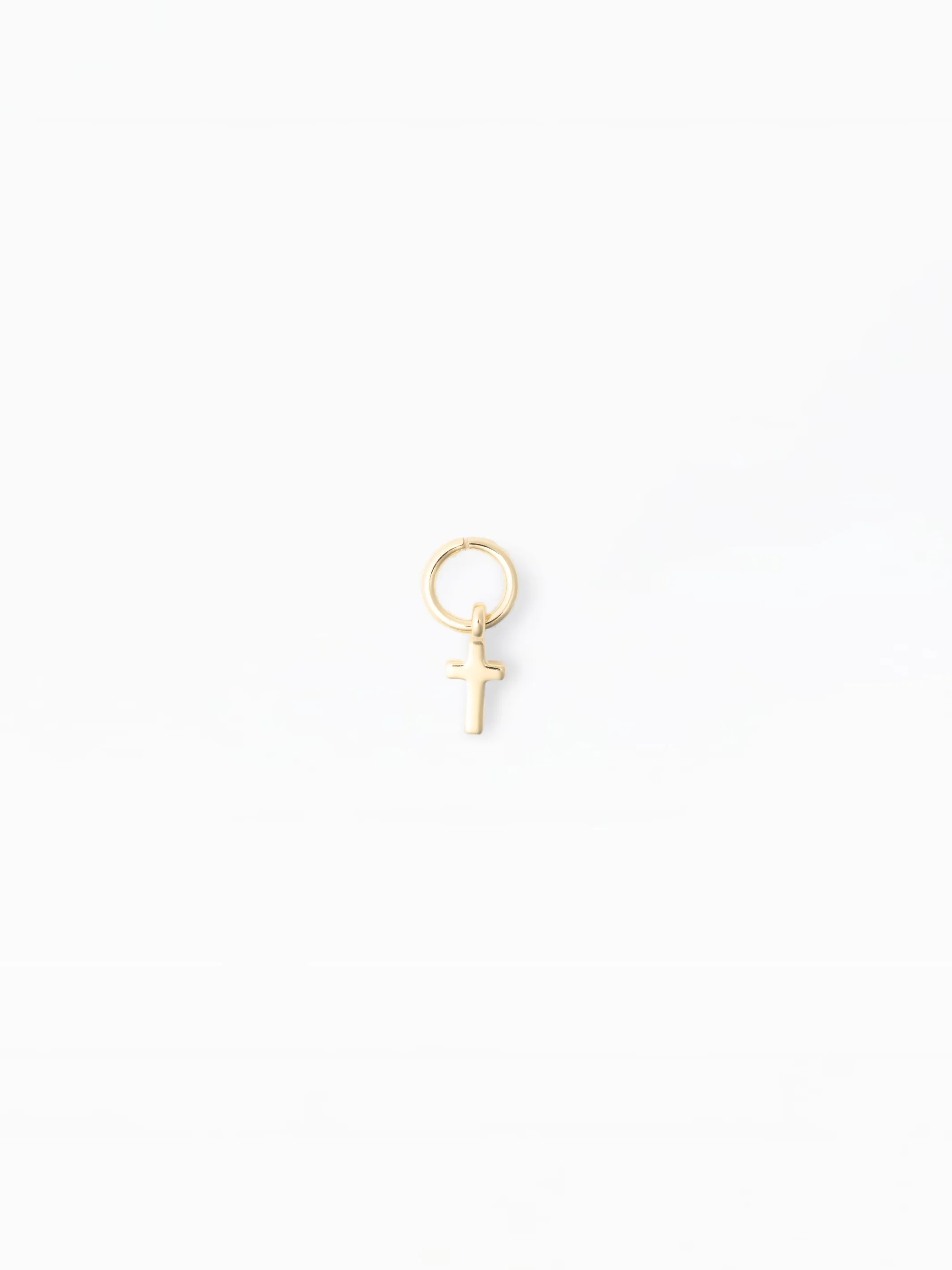 Claire Charm | Gold Cross sold by Michelle McDowell