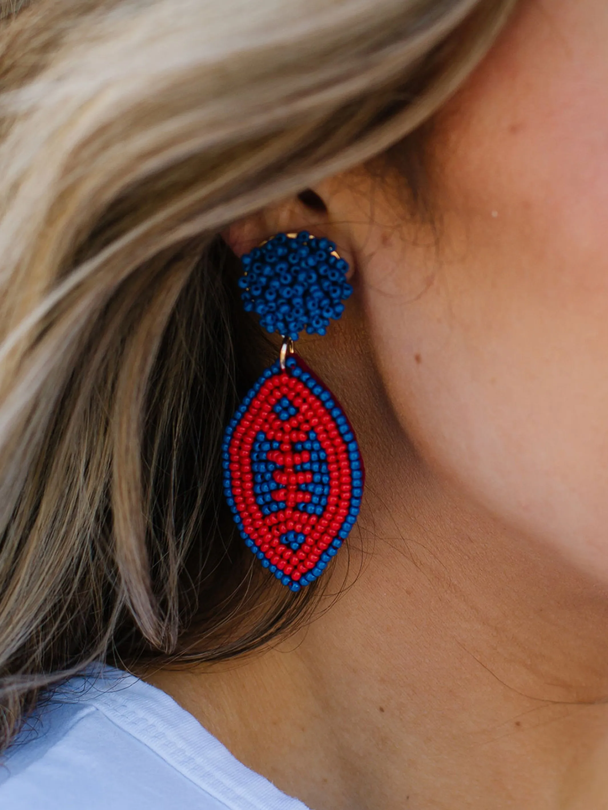 Football Earrings | Red + Blue sold by Michelle McDowell