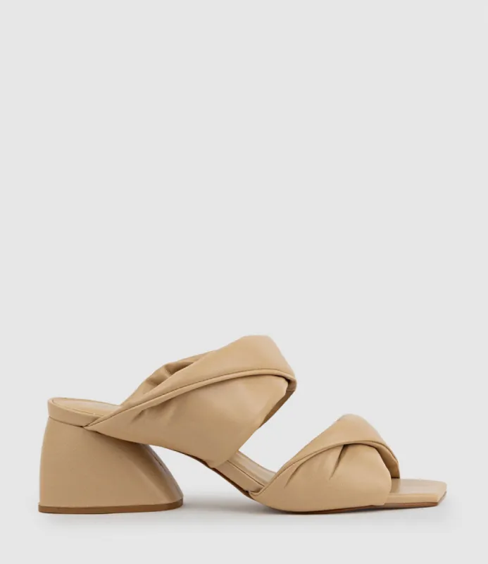 IMIRA55 Puffed Heel Slide in Cream sold by Edward Meller