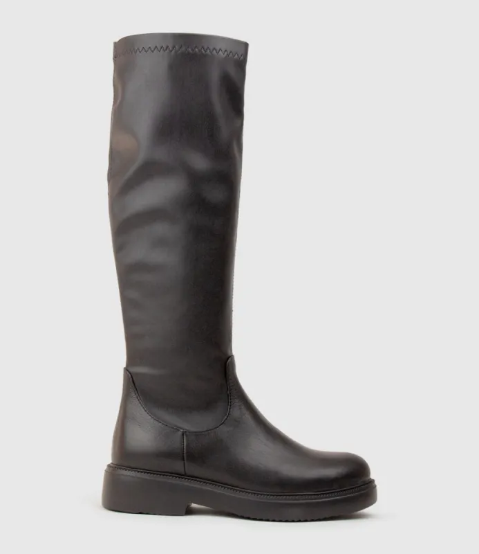 VANYA Knee High Boot on Rubber Sole in Black sold by Edward Meller