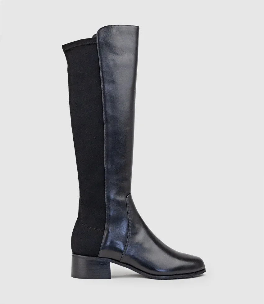 VARA40 Half and Half Knee High Boot in Black sold by Edward Meller