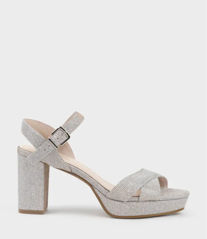 ROWAN80 Asymmetrical Platform Sandal in Silver Ritz sold by Edward Meller