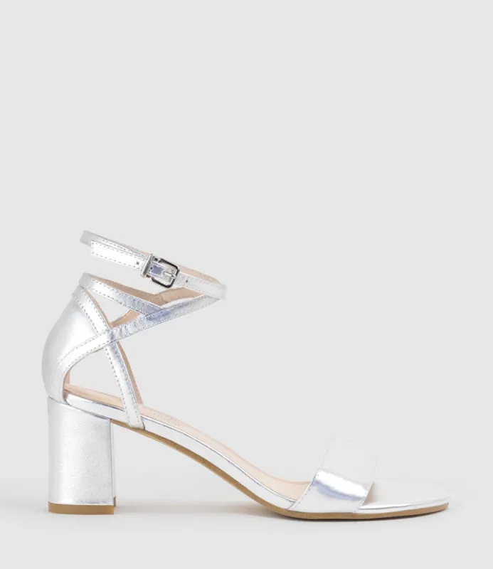 KENIA60 Block Heel Sandal with Hourglass Ankle Wrap in Silver sold by Edward Meller