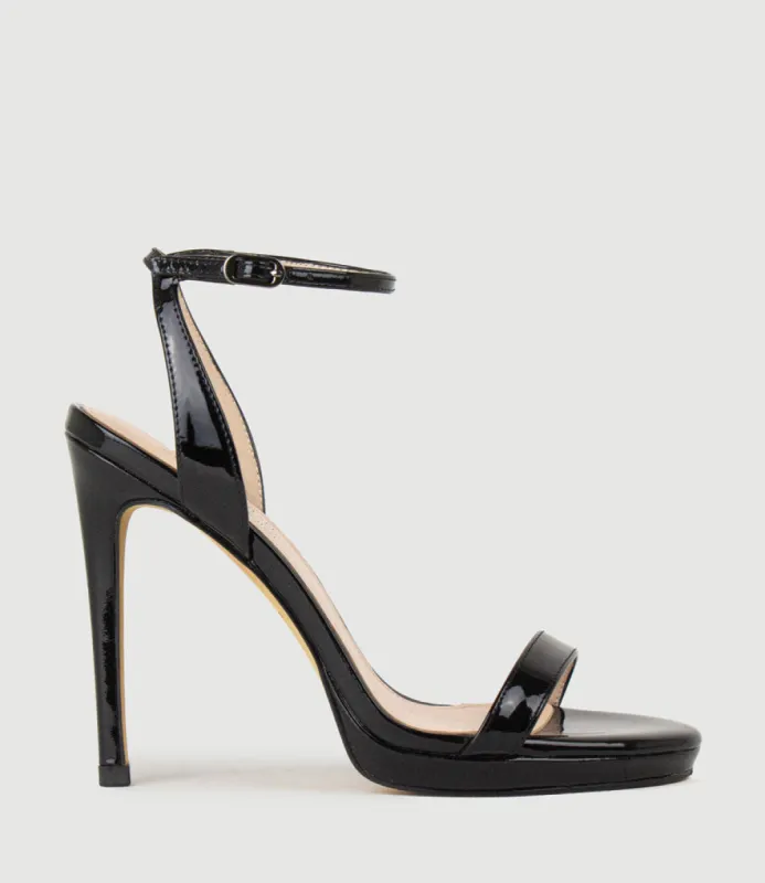 WHISPER110 Single Strap Platform Sandal in Black Patent sold by Edward Meller
