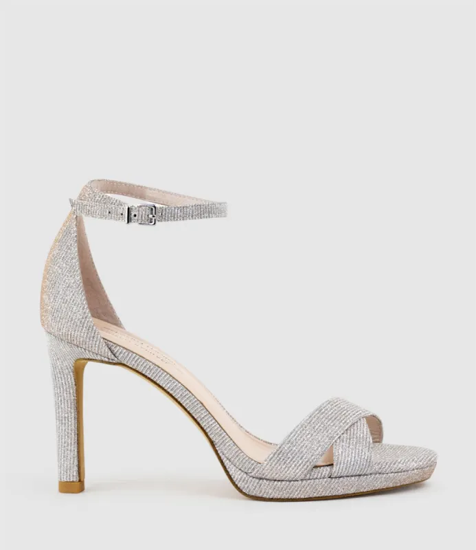 SANTO90 Asymmetrical Platform Sandal in Silver Ritz sold by Edward Meller