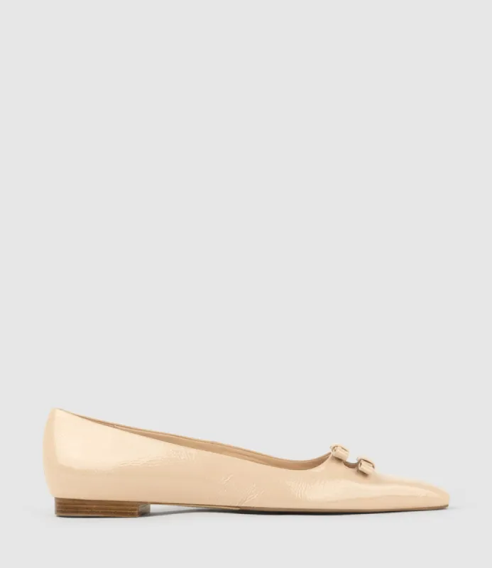 EVAINE Double Bow Flat Pump in Nude Crinkle Patent sold by Edward Meller