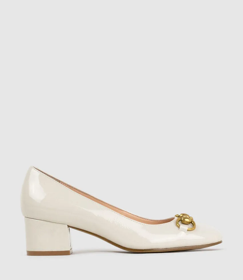 CHERISH45 Pump with Trim in Bone Patent sold by Edward Meller
