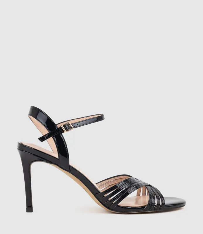 SONAS85 Strappy Sandal in Black Patent sold by Edward Meller
