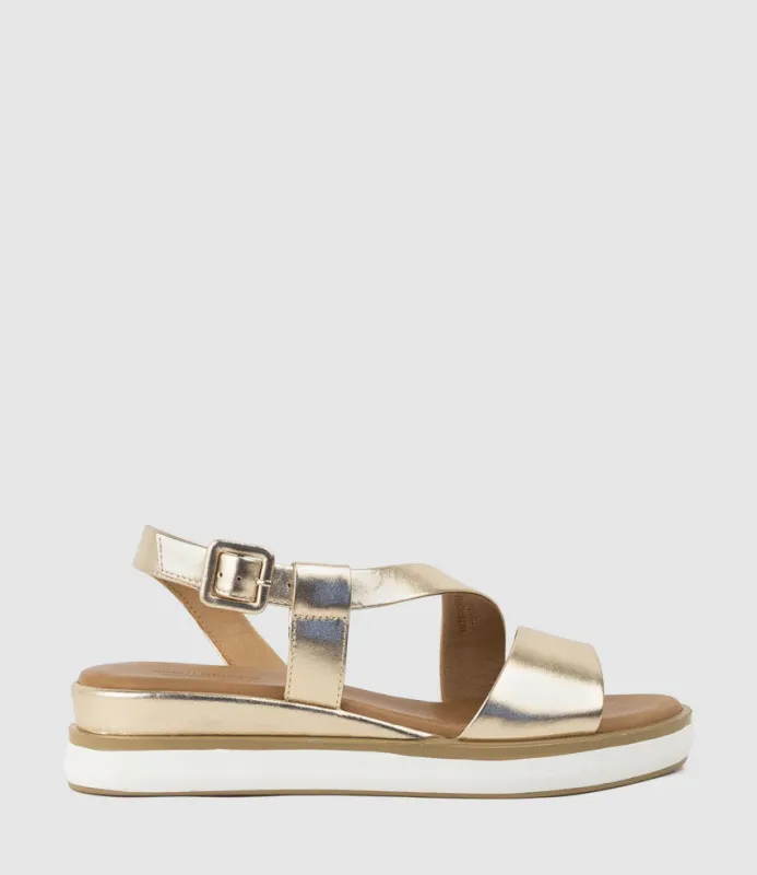 SHONA Asymmetrical Sandal on Unit in Gold sold by Edward Meller